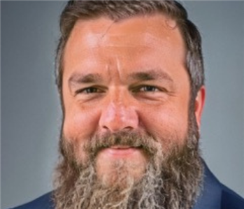 man with beard in suit