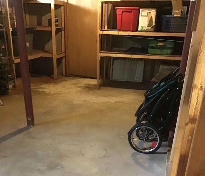 Clean basement with concrete floor